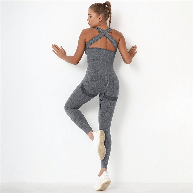 Woman wearing seamless high waist bodysuit, showing back view, ideal for women's gym clothing, gray color, push-up design, SF0021.