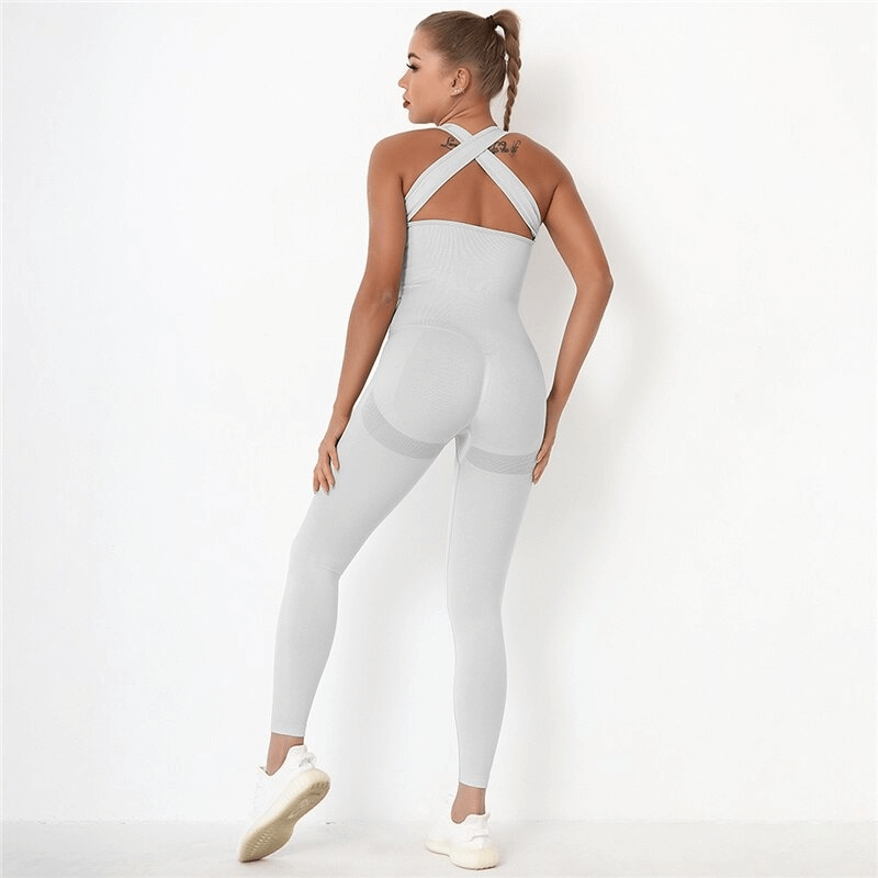 Woman wearing high waist seamless bodysuit with push-up effect for gym, emphasizing comfort and style in light grey.