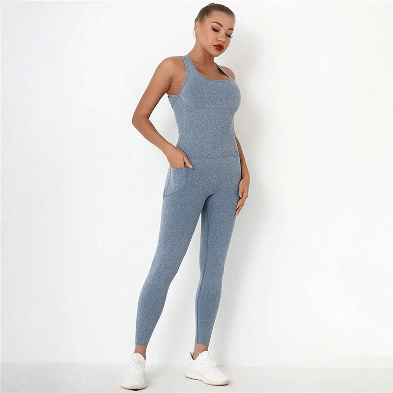 Woman wearing seamless high-waist bodysuit in blue, perfect for gym workouts, enhances hips, made of nylon-spandex for comfort.