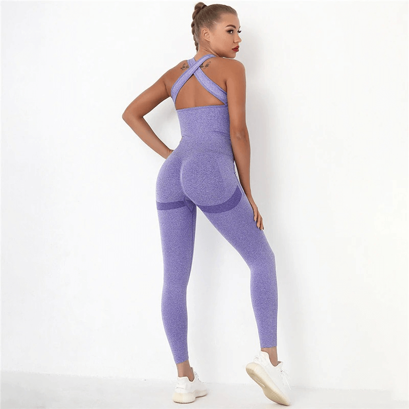 Woman wearing seamless high waist purple bodysuit for gym with hips push-up, showcasing sleek back design