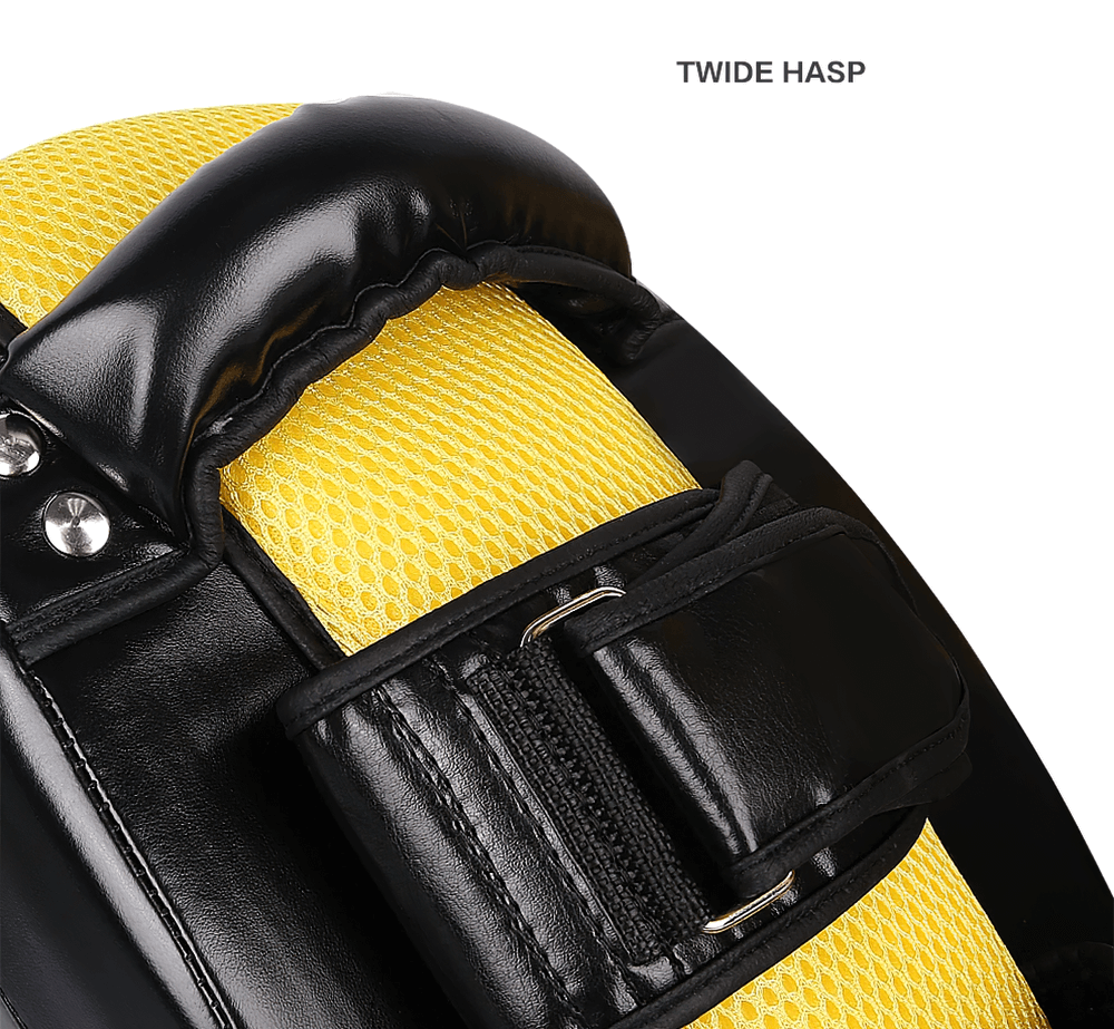 Close-up of Muay Thai kick pad's secure dual arm straps and grip bar with mesh panel for airflow, model SF3151