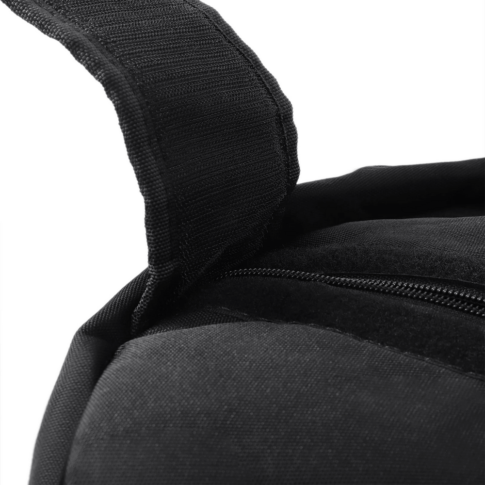 Close-up of the durable zipper and handle on a 100 LB strongman training sandbag, perfect for intense fitness workouts and conditioning.
