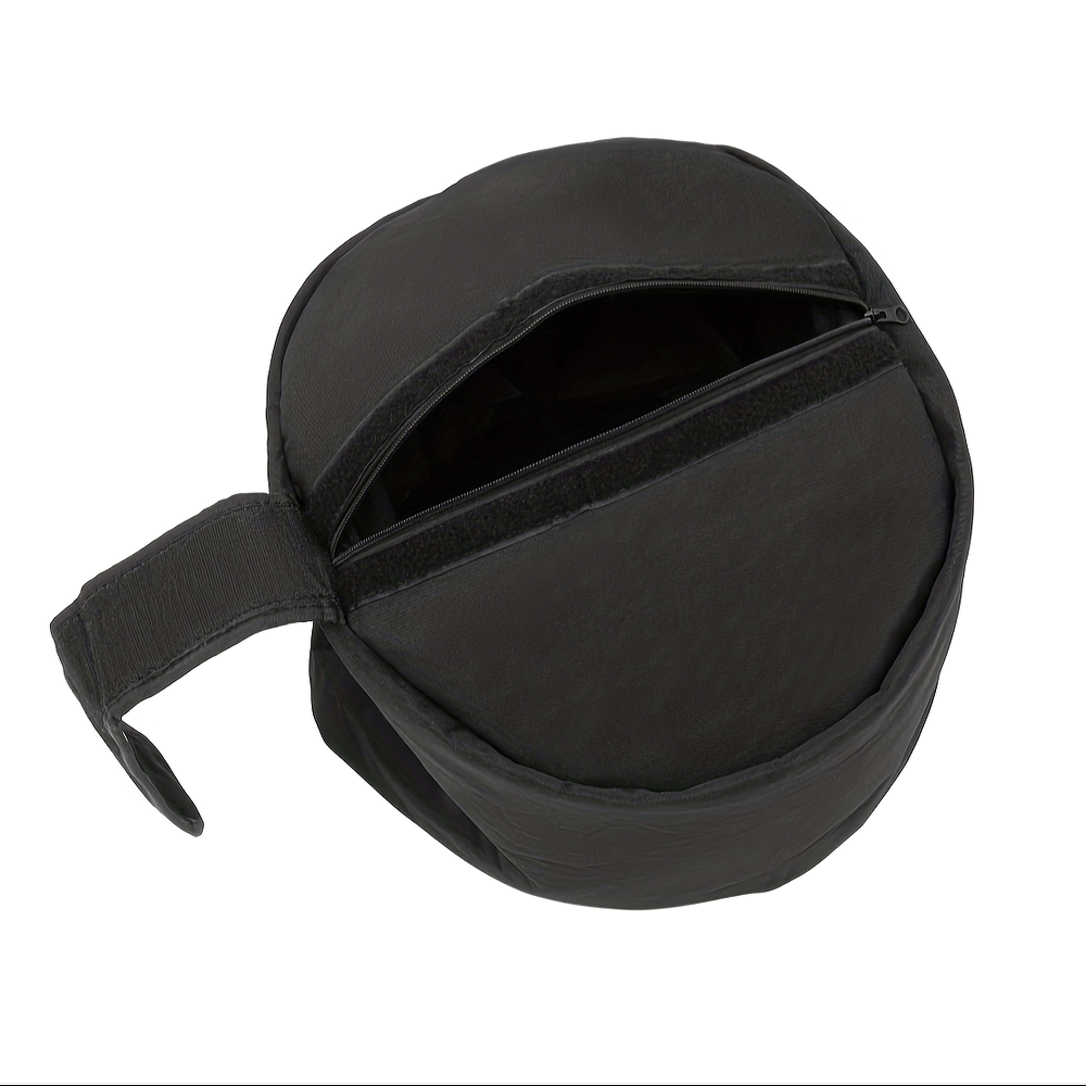 Heavy duty black sandbag with double Velcro closure for weight training, shown open to display rugged 1050D nylon Cordura fabric.