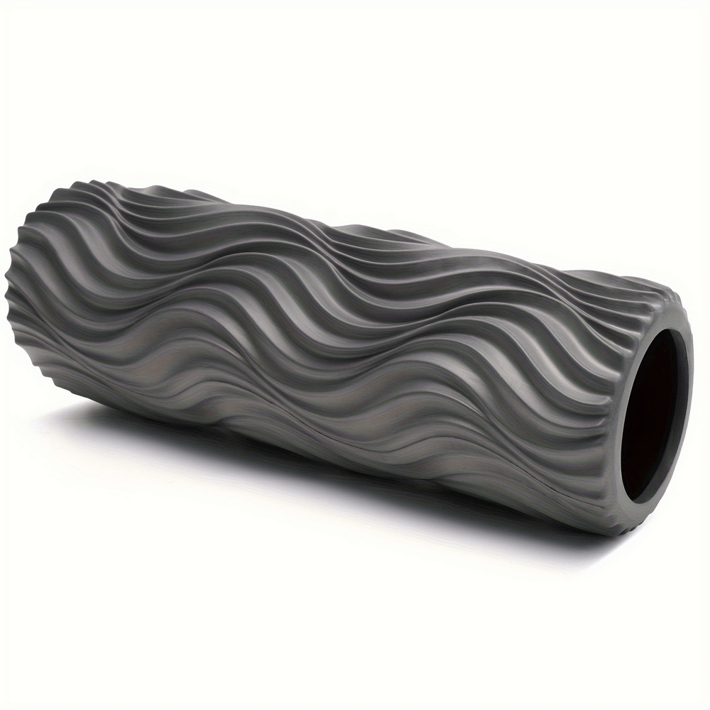 Gray 15-inch wavy texture foam roller for deep muscle massage and tension relief.