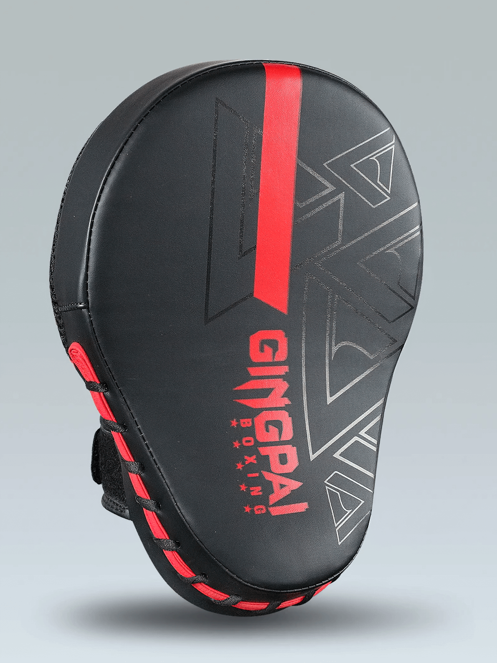 Black and red PU leather boxing target pad with ergonomic design for training and sparring in MMA and boxing.