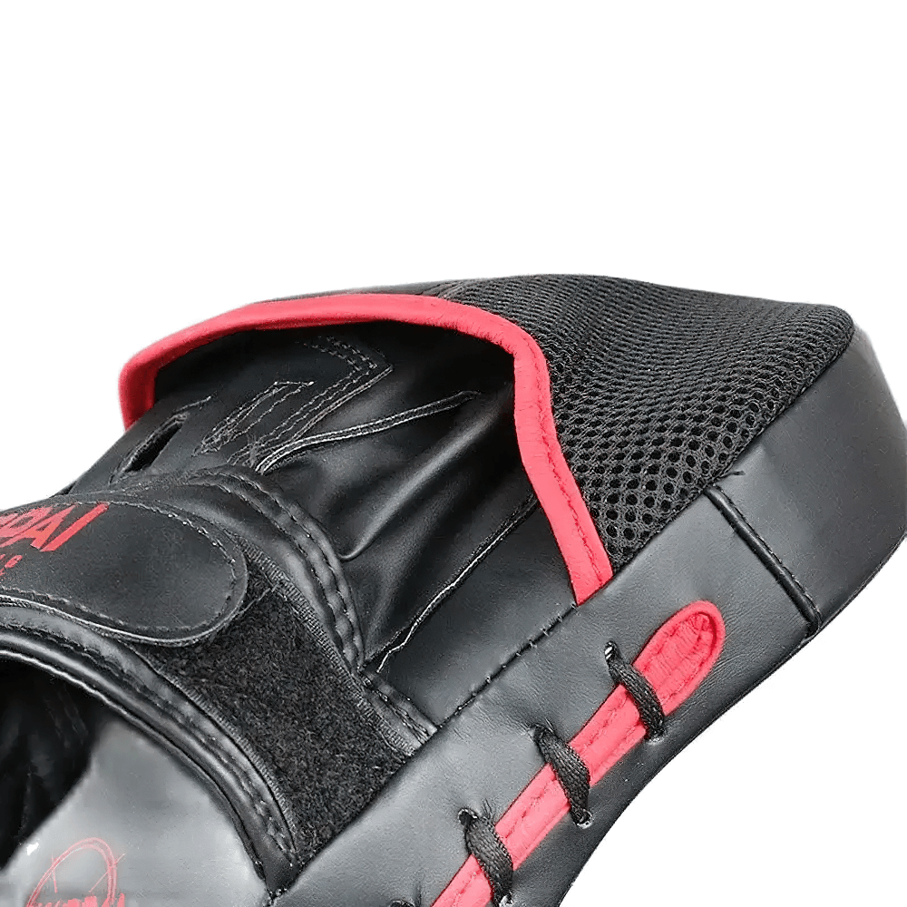 Black and red boxing PU leather target pad with ergonomic design, ideal for training MMA and boxing, featuring Velcro closure.