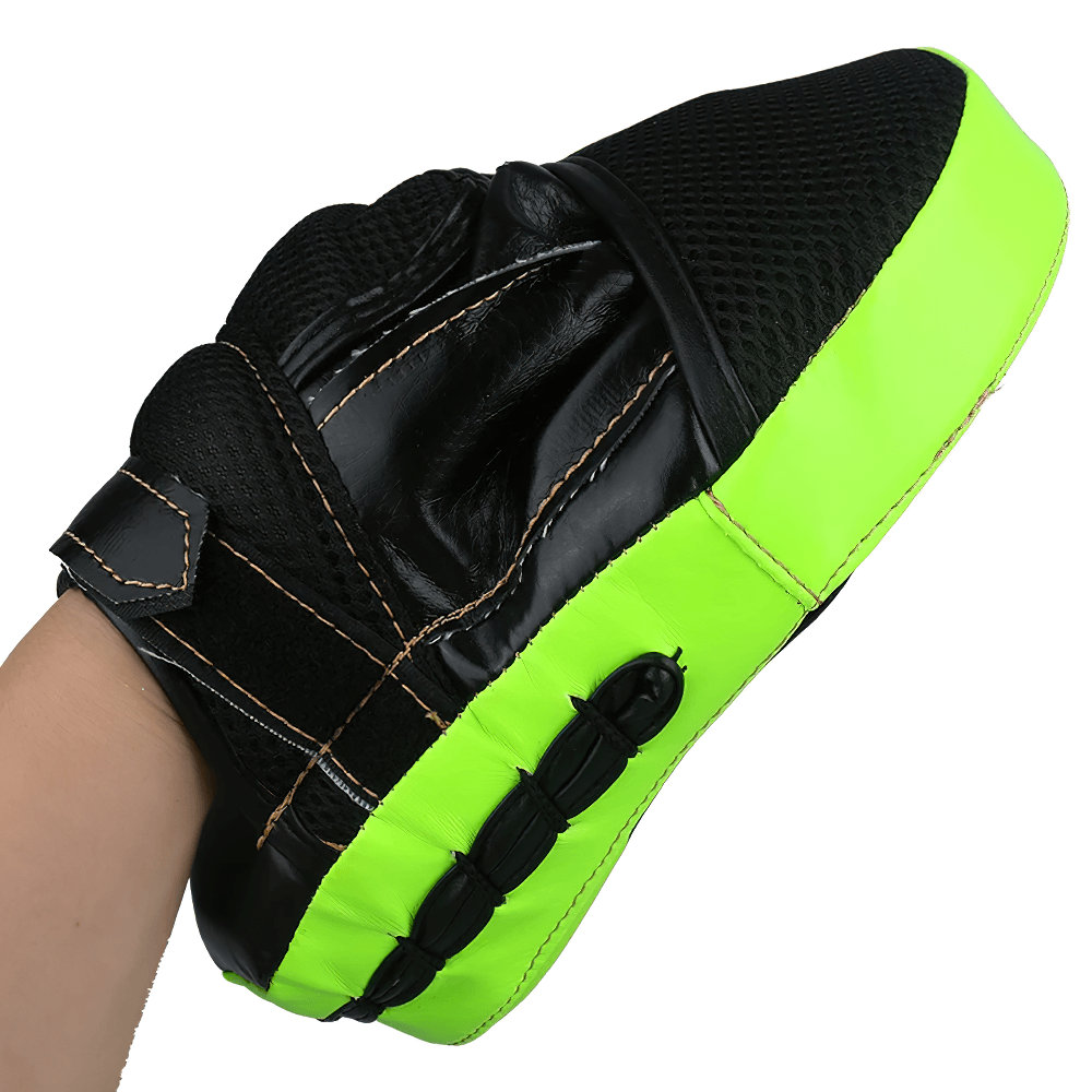 Curved boxing focus mitt with wrist strap in neon green and black, made of PU leather, ideal for sparring and punch training.