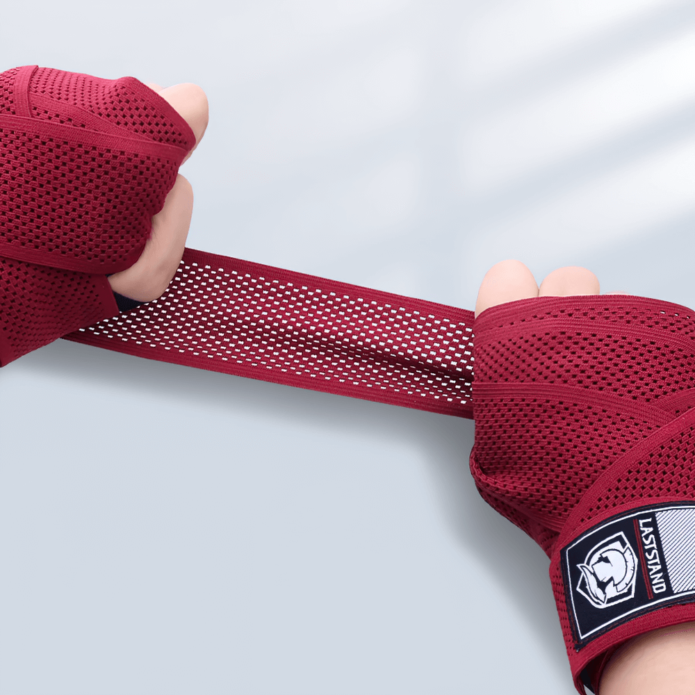 Unisex mesh boxing hand wraps in red, perfect for Muay Thai and kickboxing, providing durable wrist support during training.