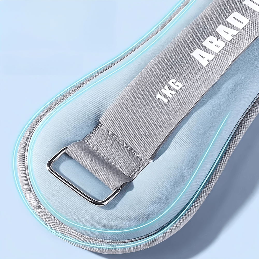 Close-up of adjustable ankle and wrist weight strap for yoga and fitness, featuring durable hook-and-loop closure and sleek design.