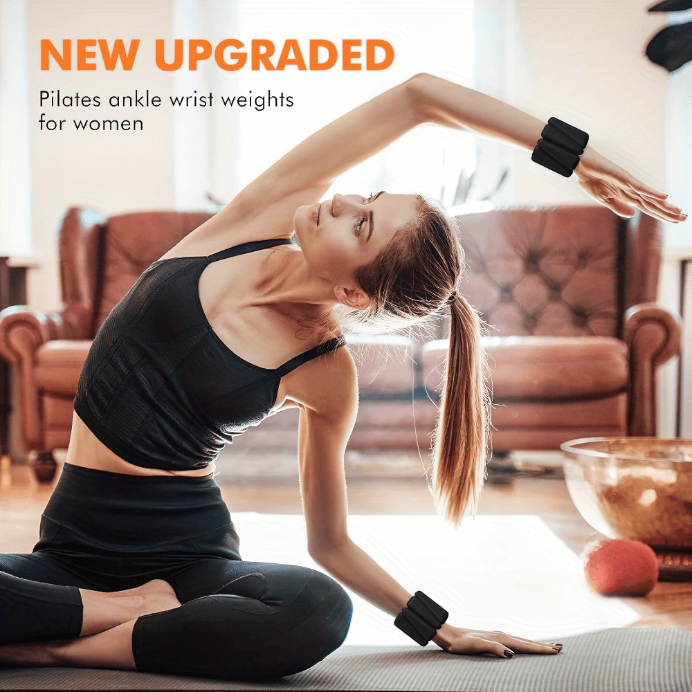 Woman practicing yoga wearing adjustable silicone wrist weights for enhanced workout.