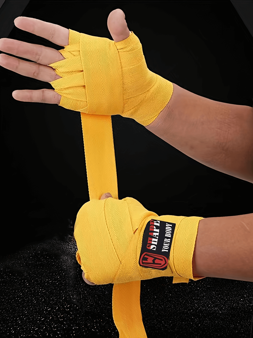 Yellow boxing hand wraps SF2707 providing wrist and fist support for boxing and kickboxing. Secure fit with hook and loop closure.