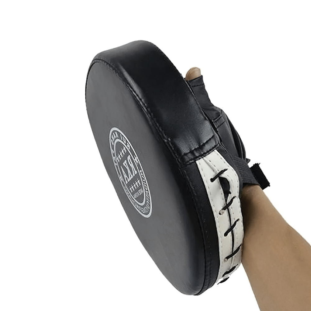 Person holding RKA curved boxing focus pad for sparring, featuring durable PU material and ergonomic design for optimal strike training.