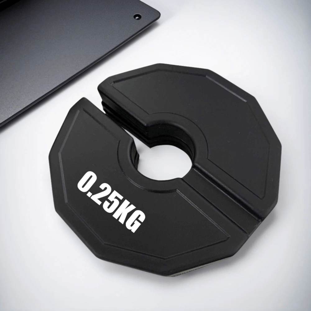 Black 0.25 kg fractional weight plate with rubber coating for precise weight lifting adjustments.