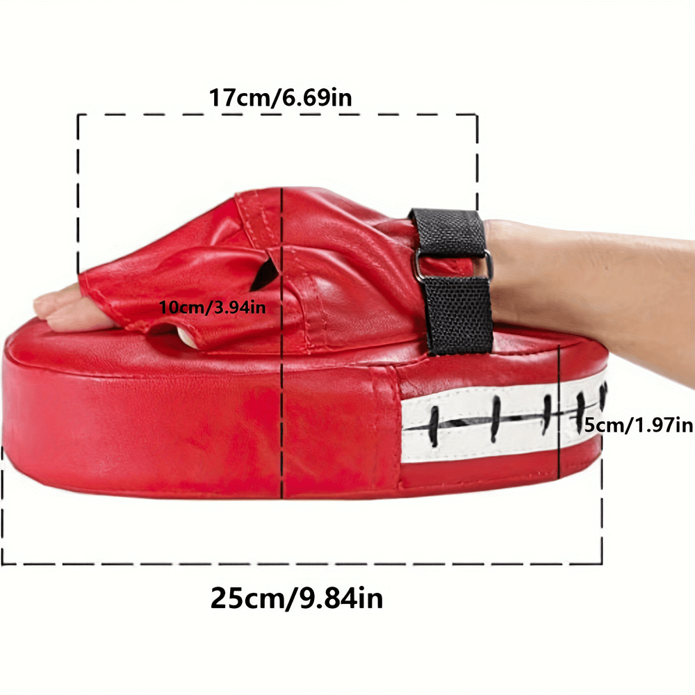 Red boxing focus pads with secure wrist strap, PU leather, foam padding for martial arts training. Dimensions: 17cm x 25cm.