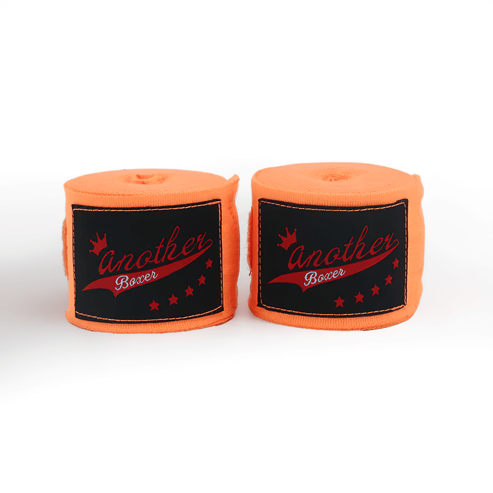 2-piece orange boxing wrist wraps for Muay Thai, MMA, and kickboxing; durable and supportive for training.