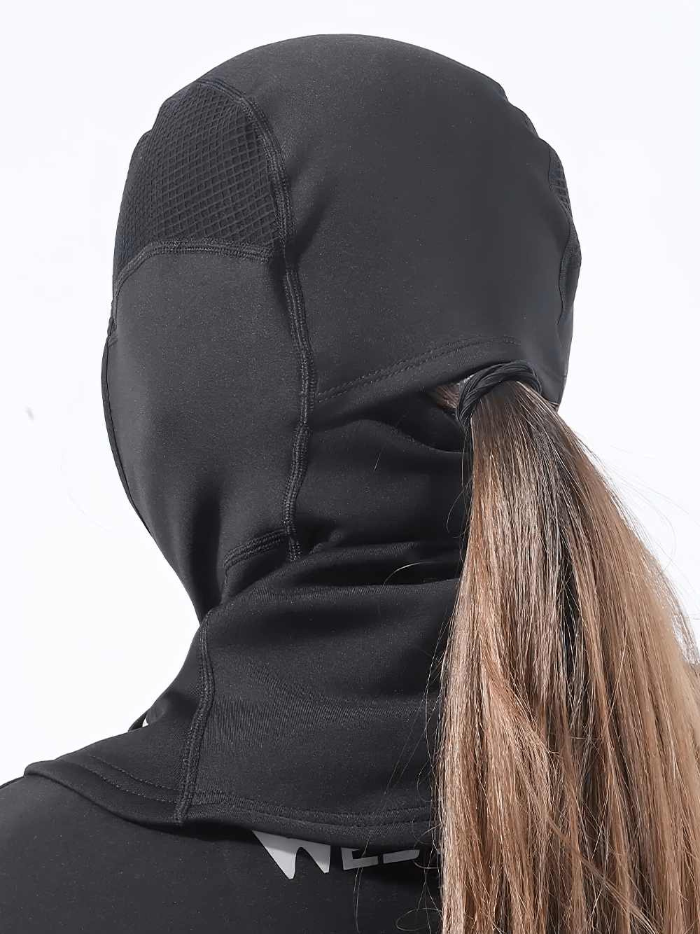 Model wearing black 3-in-1 thermal balaclava with extended neck protection and ponytail opening.