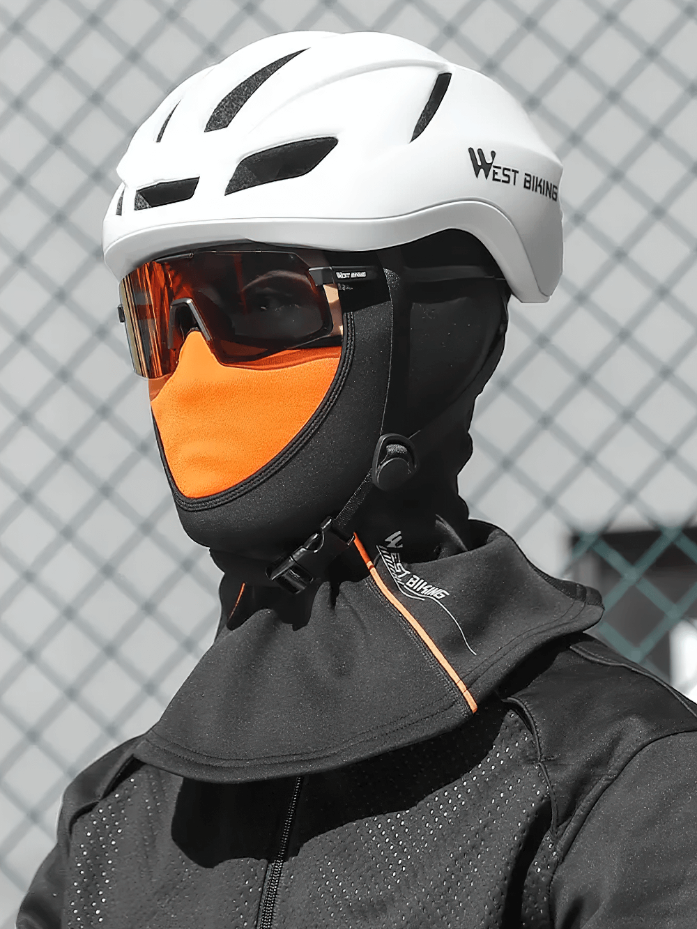 Person wearing 3-in-1 thermal balaclava with face mask and scarf, showcasing windproof design in outdoor winter setting.