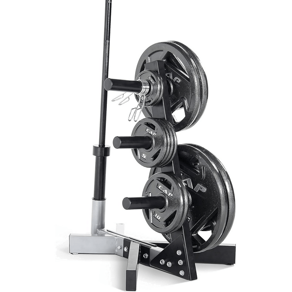 Cast iron weight plates on barbell rack for home or gym strength training