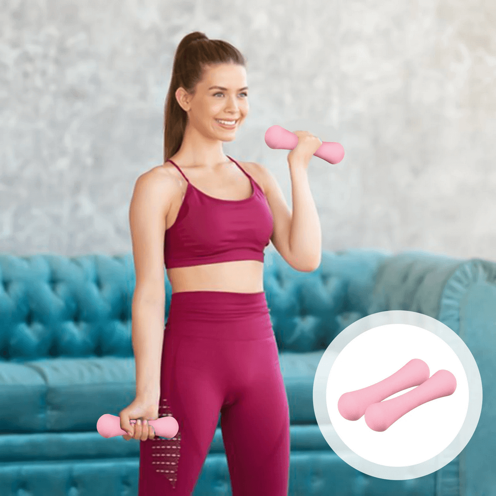 Woman exercising with pink 500g cast iron dumbbell, ideal for yoga, boxing, muscle fitness, and rehab training.