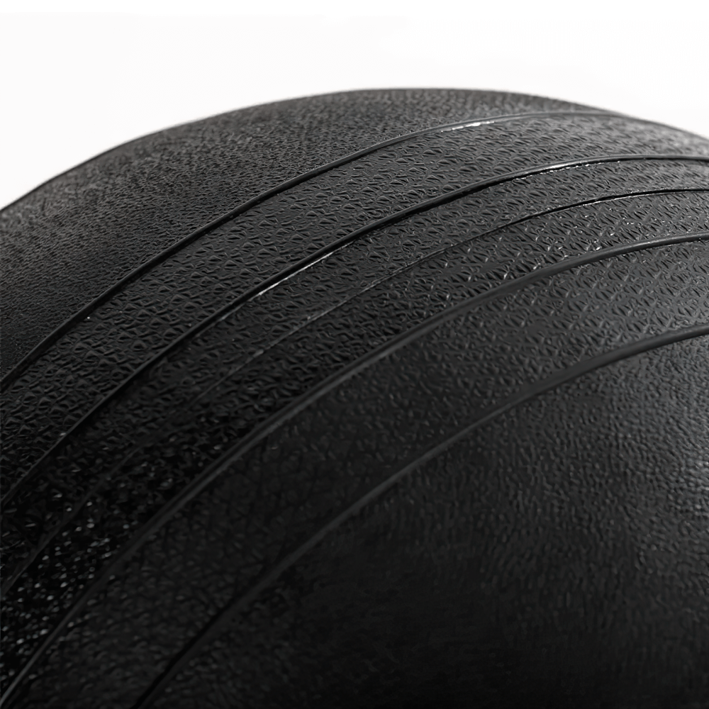 Close-up of Titan Fitness 55 LB textured rubber slam ball for cross training, featuring durable grip for high-intensity workouts.