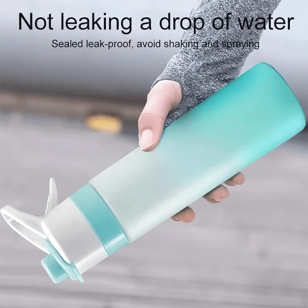 650ml Spray Water Bottle for Outdoor Activities - SF3492 held in hand, showcasing leakproof design and mist spray function for workouts.