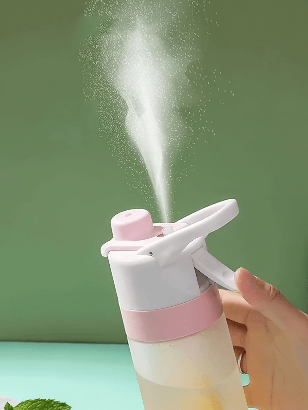 650ml Spray Water Bottle for Outdoor Activities - SF3492 misting in action, perfect for hydration during fitness and travel.