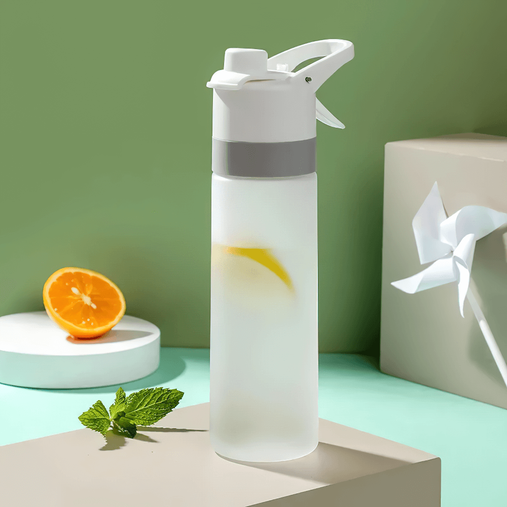 650ml Spray Water Bottle for Outdoor Activities - SF3492, BPA-free mist spray bottle for fitness and travel, shown with lemon and mint.