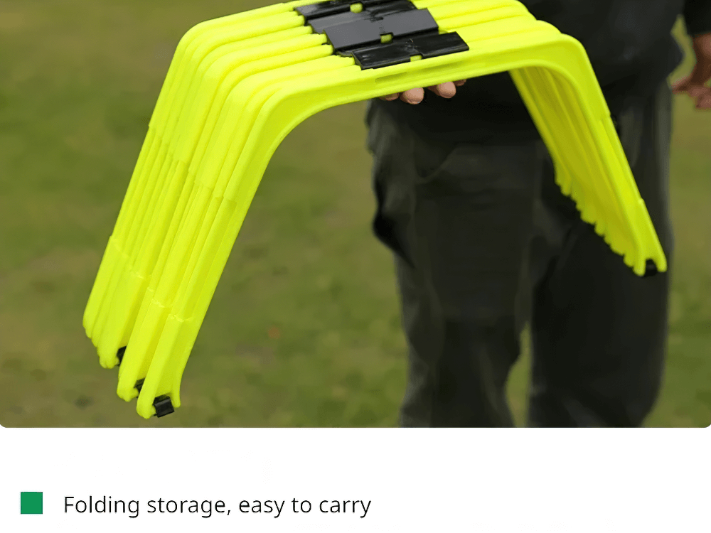 Bright yellow hexagonal hurdles in hand, showcasing their foldable design for easy transport and storage during agility drills.