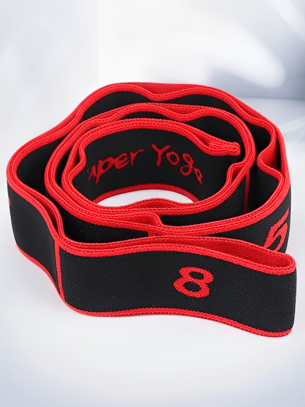 Red and black 8-section dance and yoga resistance stretch band for Pilates and flexibility training, featuring numbered loops.