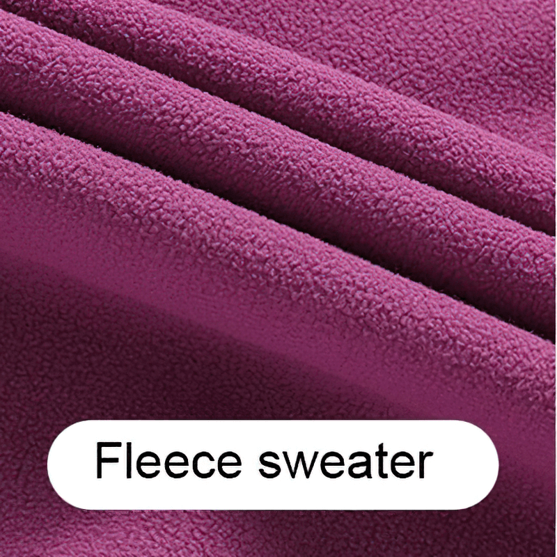 Close-up of vibrant purple fleece fabric texture with label 'Fleece sweater' showcasing the soft and warm material.