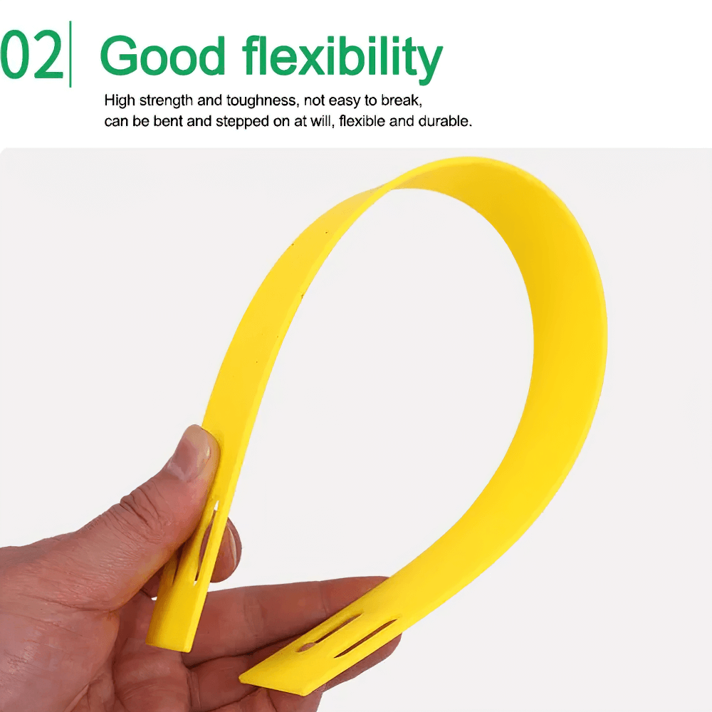 Person bending a durable, flexible yellow agility ladder rung, showcasing its toughness and flexibility for speed training.