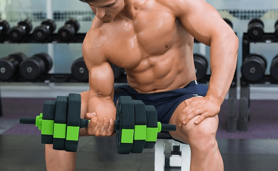 Man using Adjustable Dumbbell from 4-in-1 Weight Set for strength training in a gym setting.