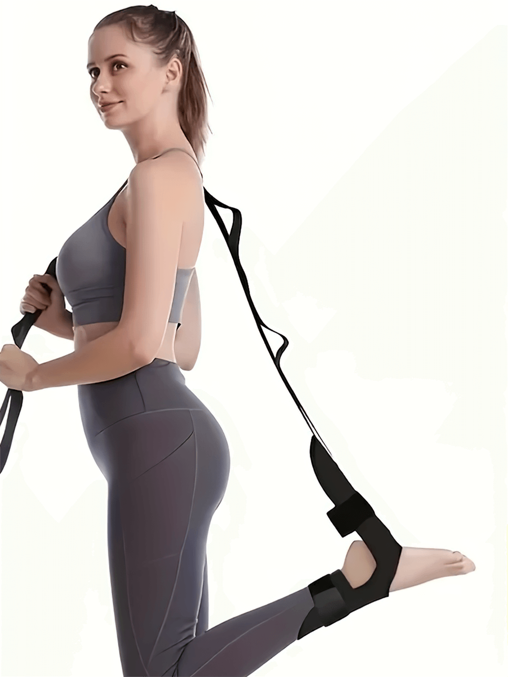 Woman using adjustable foot stretching band SF3319 for yoga, enhancing flexibility, balance, and strength; ideal for training and rehab.