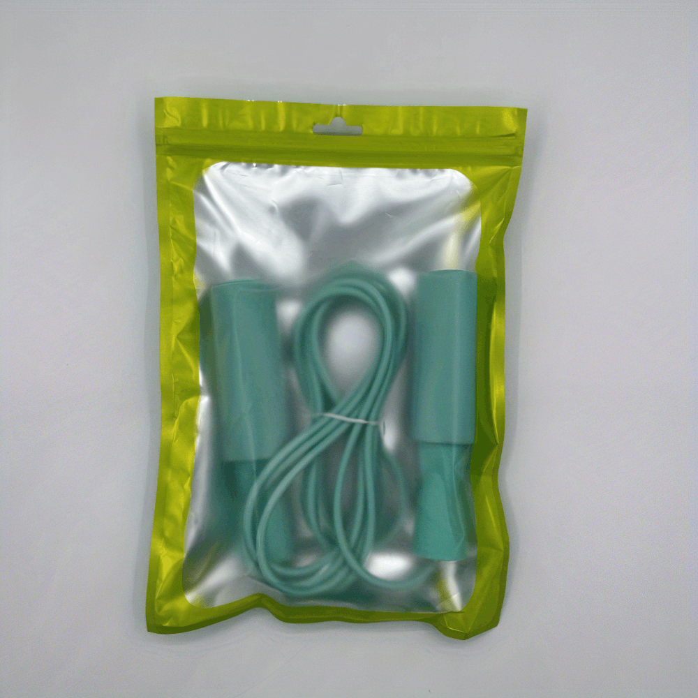 Adjustable steel wire jump rope SF2761 with green handles in packaging, perfect for fitness enthusiasts and cardio training.