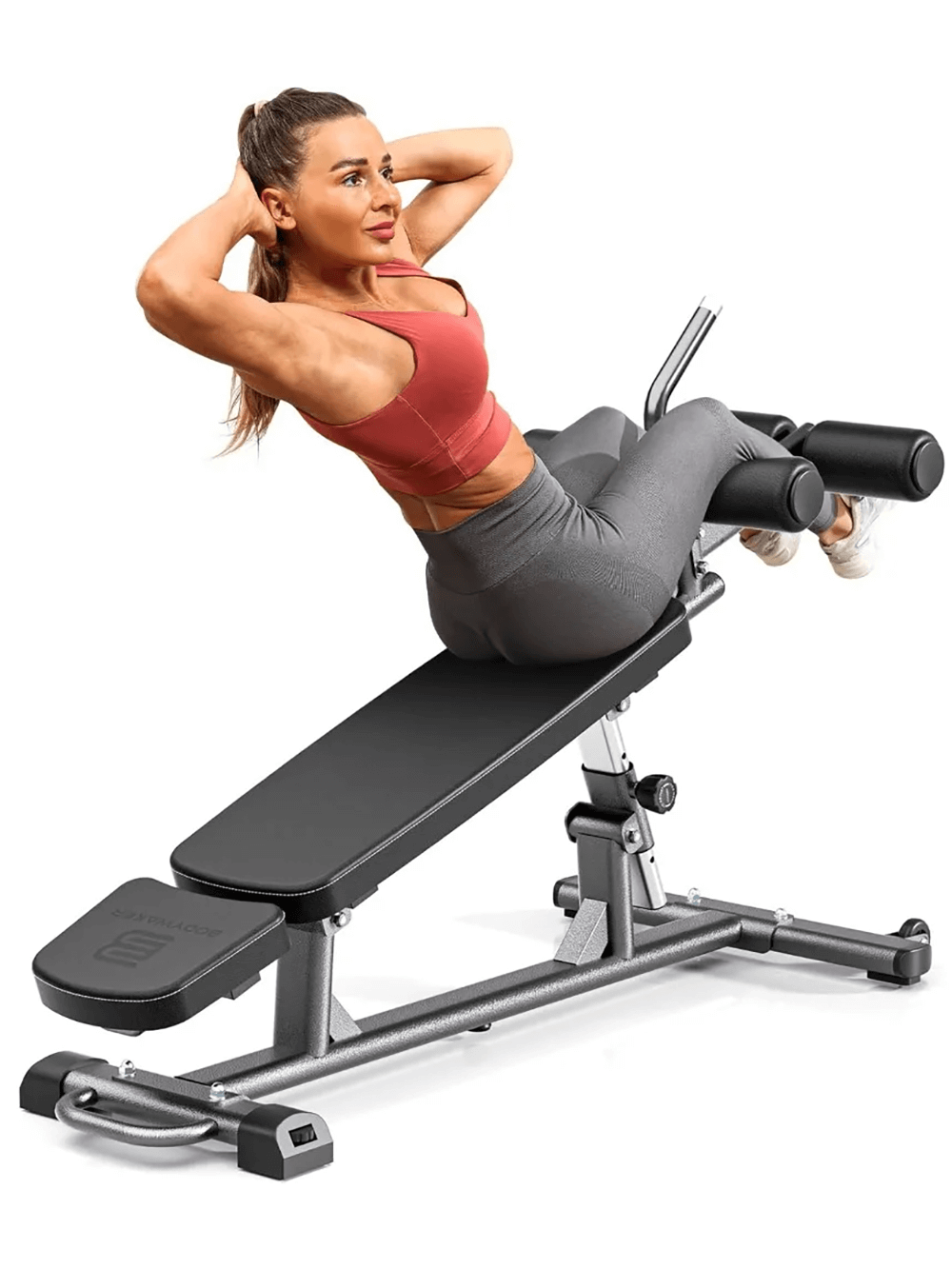 Woman using the Adjustable Sit-Up Bench with Reverse Crunch Handle - SF3442 for core strength training.