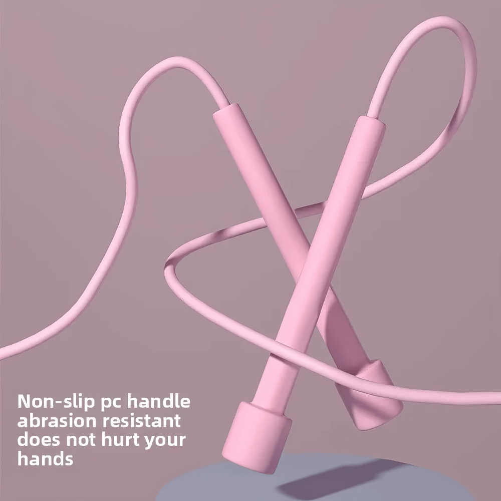 Pink adjustable skipping rope with anti-slip handles, showcasing tangle-free design and durability for fitness, cardio, and endurance.