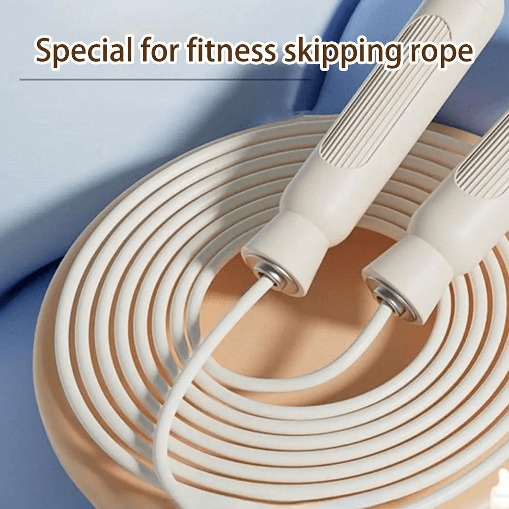 Alt Tag: Adjustable skipping rope with non-slip handles ideal for cardio and endurance training, featuring a durable PVC cable.