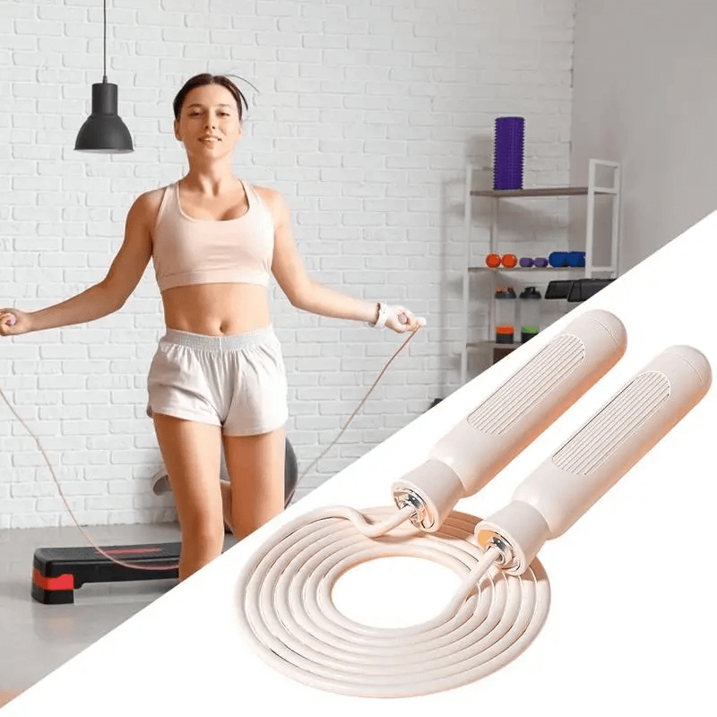 Woman exercising with adjustable skipping rope SF3194 for cardio, showing non-slip handles and durable PVC cable.