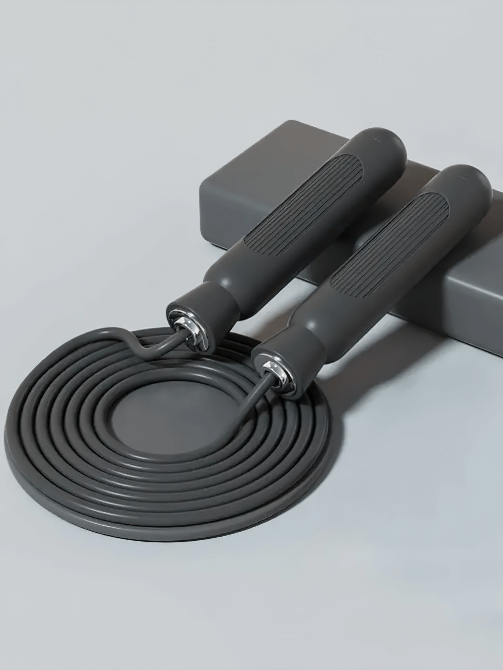 Adjustable skipping rope SF3194 with non-slip handles, ideal for cardio and endurance training, shown on a minimalist backdrop.