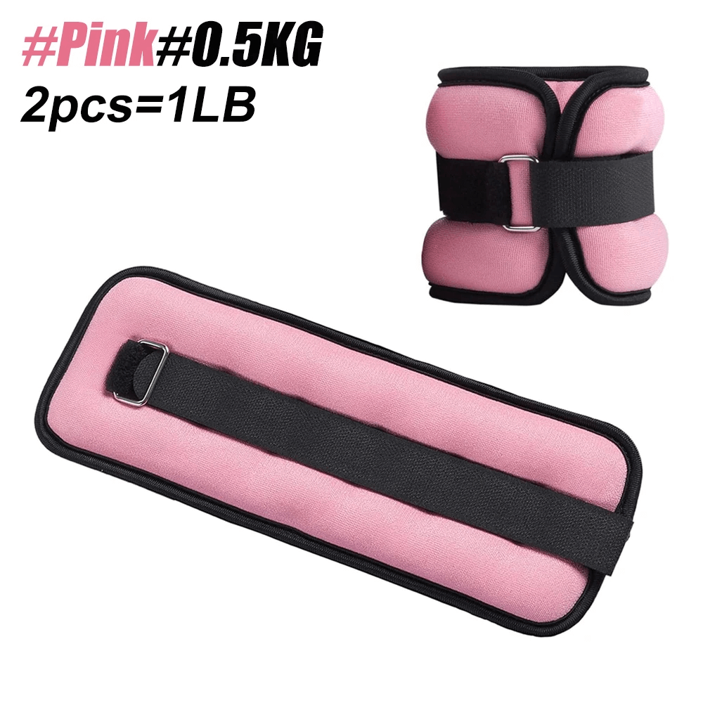 Pink adjustable wrist and ankle weights, 0.5 kg, soft material with secure straps, ideal for fitness and cardio activities.