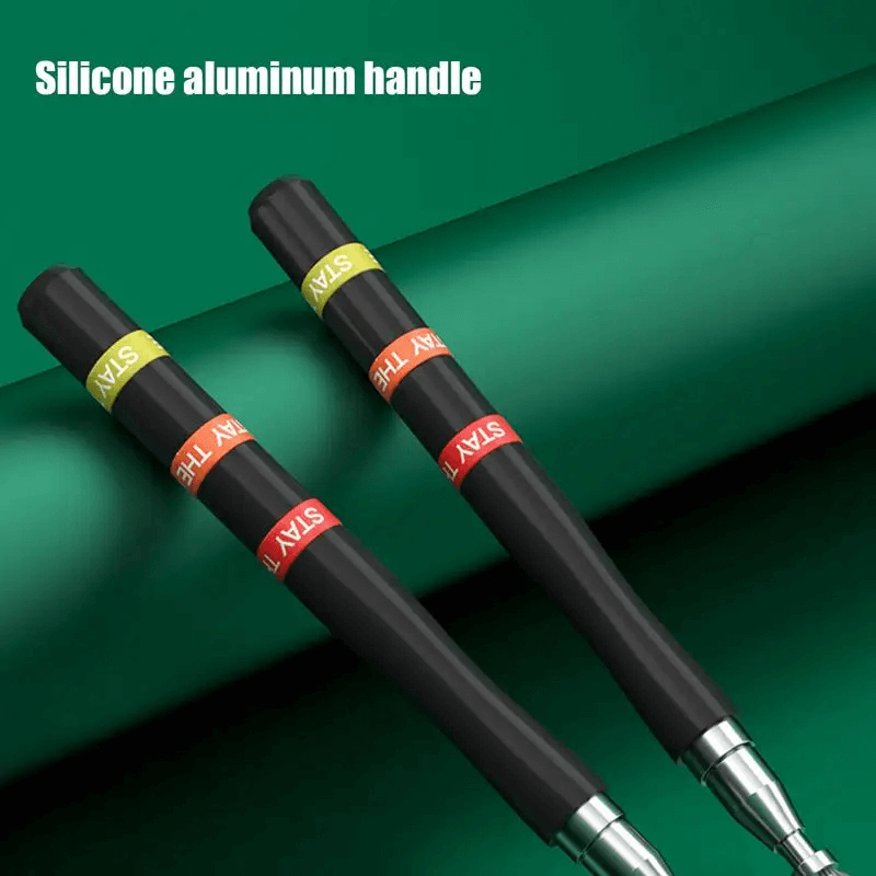 Adjustable speed jump rope handles with silicone grips, featuring vibrant colored bands, against a green background.