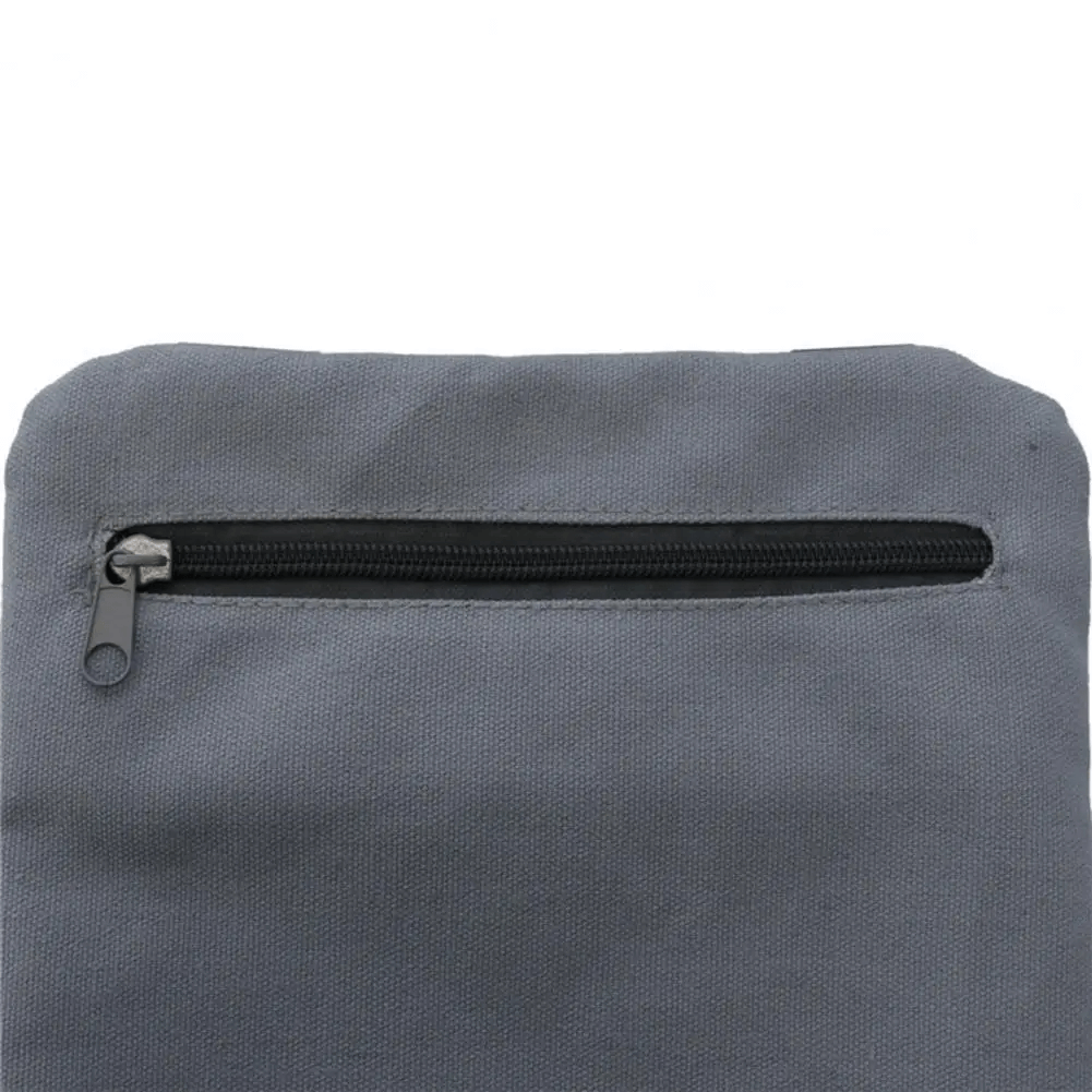 Close-up of durable fabric and zipper closure on adjustable weighted sandbag, perfect for yoga and fitness training.