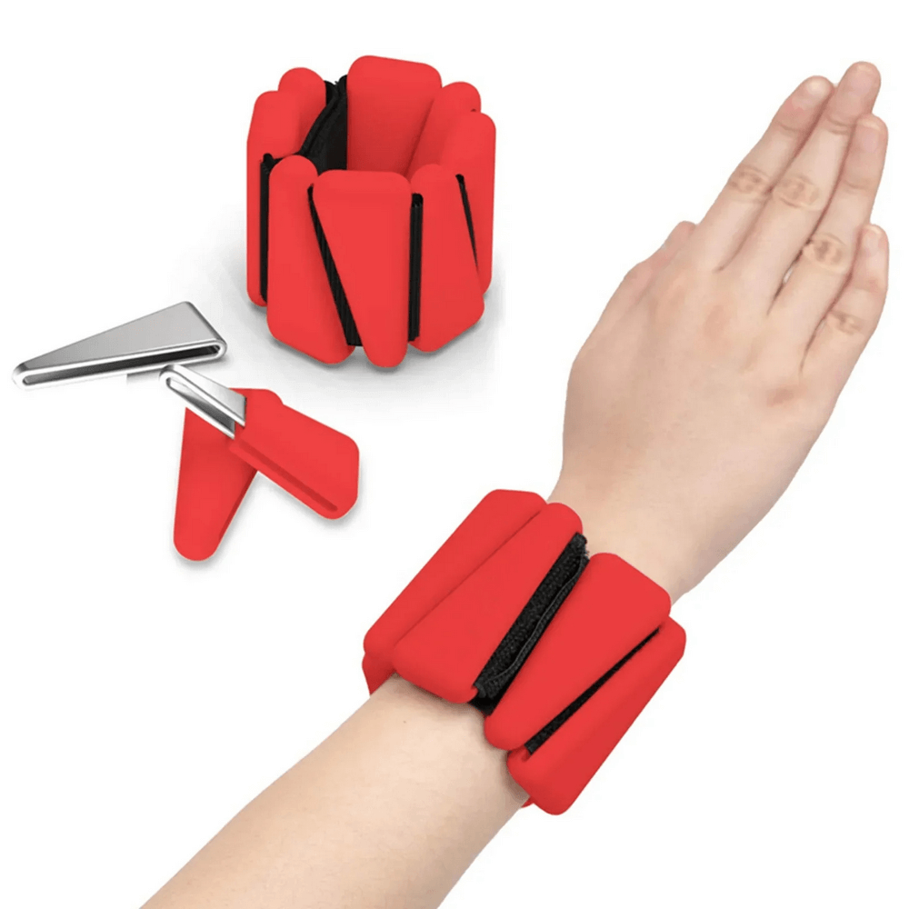 Red adjustable wrist weights for fitness, featuring durable elastic strap and ergonomic design on a hand.