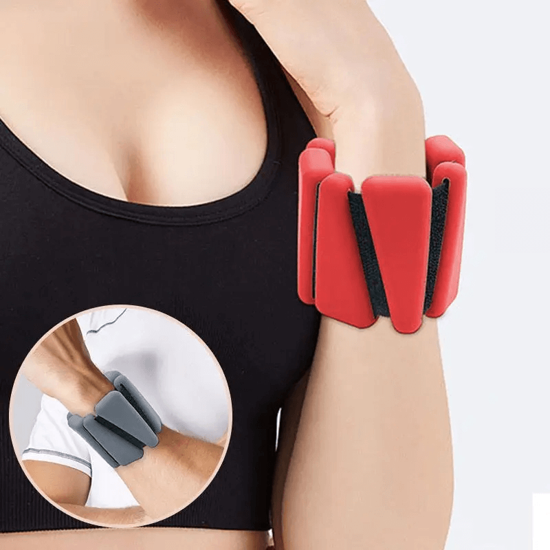 Red adjustable wrist weights for fitness, shown on a woman's wrist with inset image of gray weights, ideal for workouts and training.