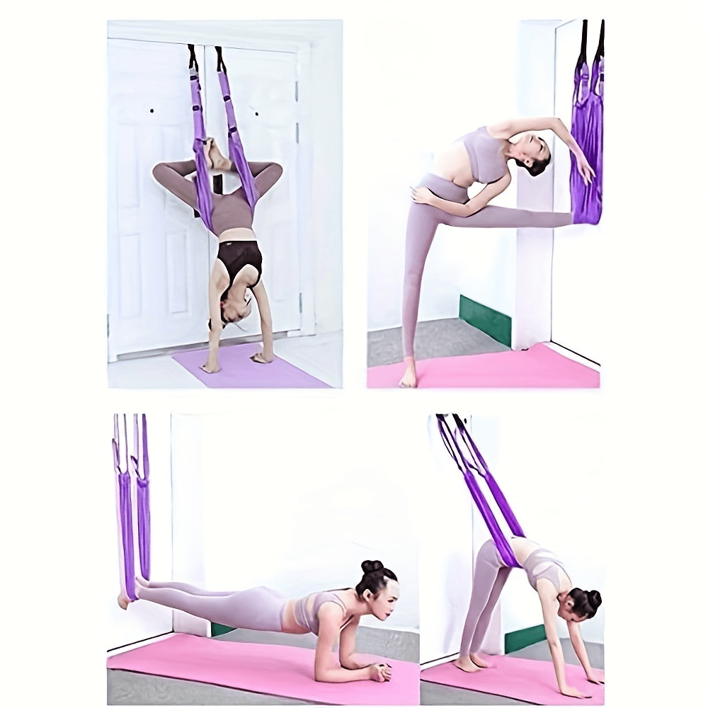 Woman using aerial yoga hammock for stretching, inversion therapy, and core training in home gym setup.