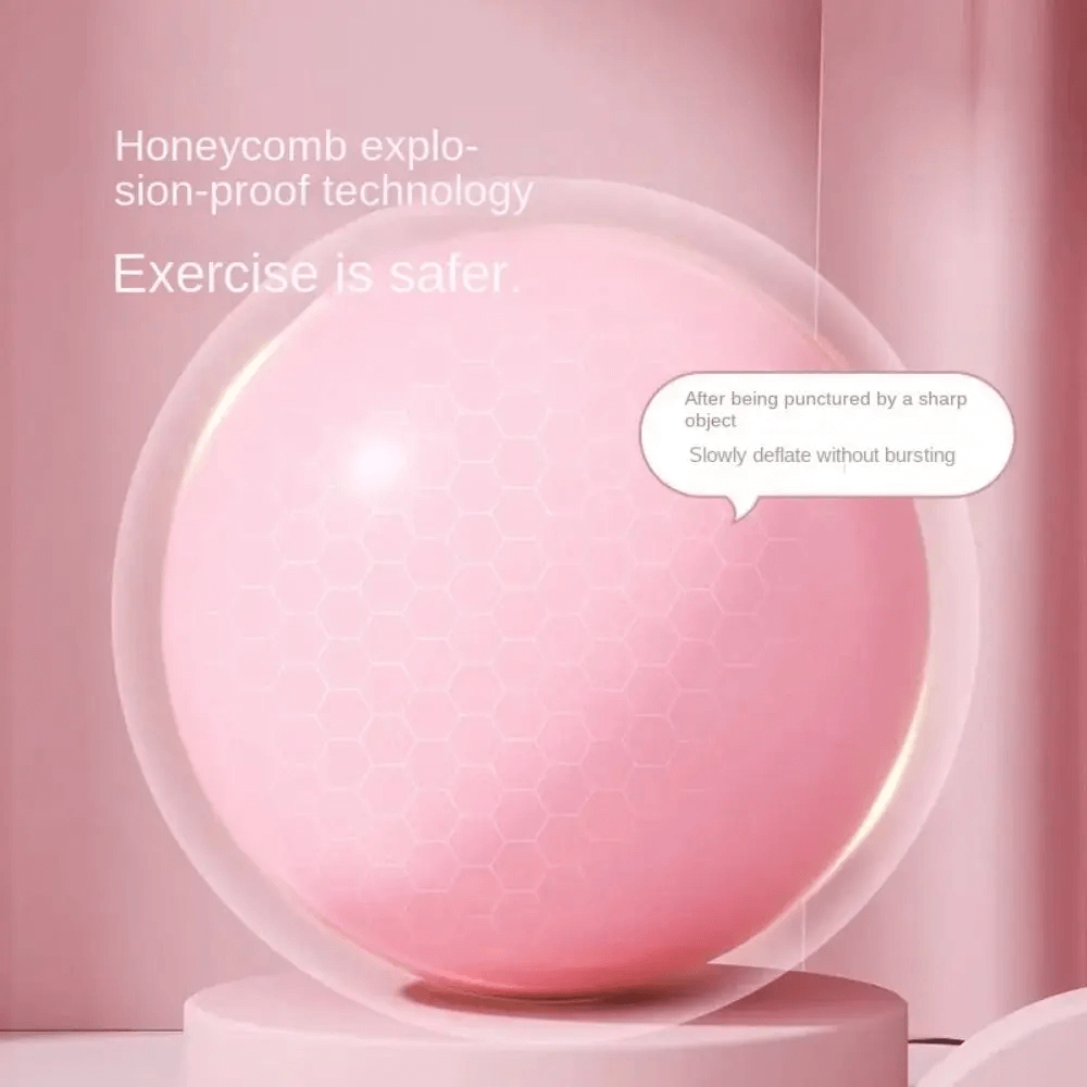 Anti-explosion pink Pilates yoga ball with honeycomb technology for safe workouts.