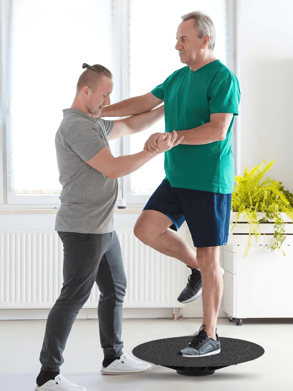 Person assisting another on an anti-slip balance board, SF3367, for core training and coordination, enhancing workout stability.
