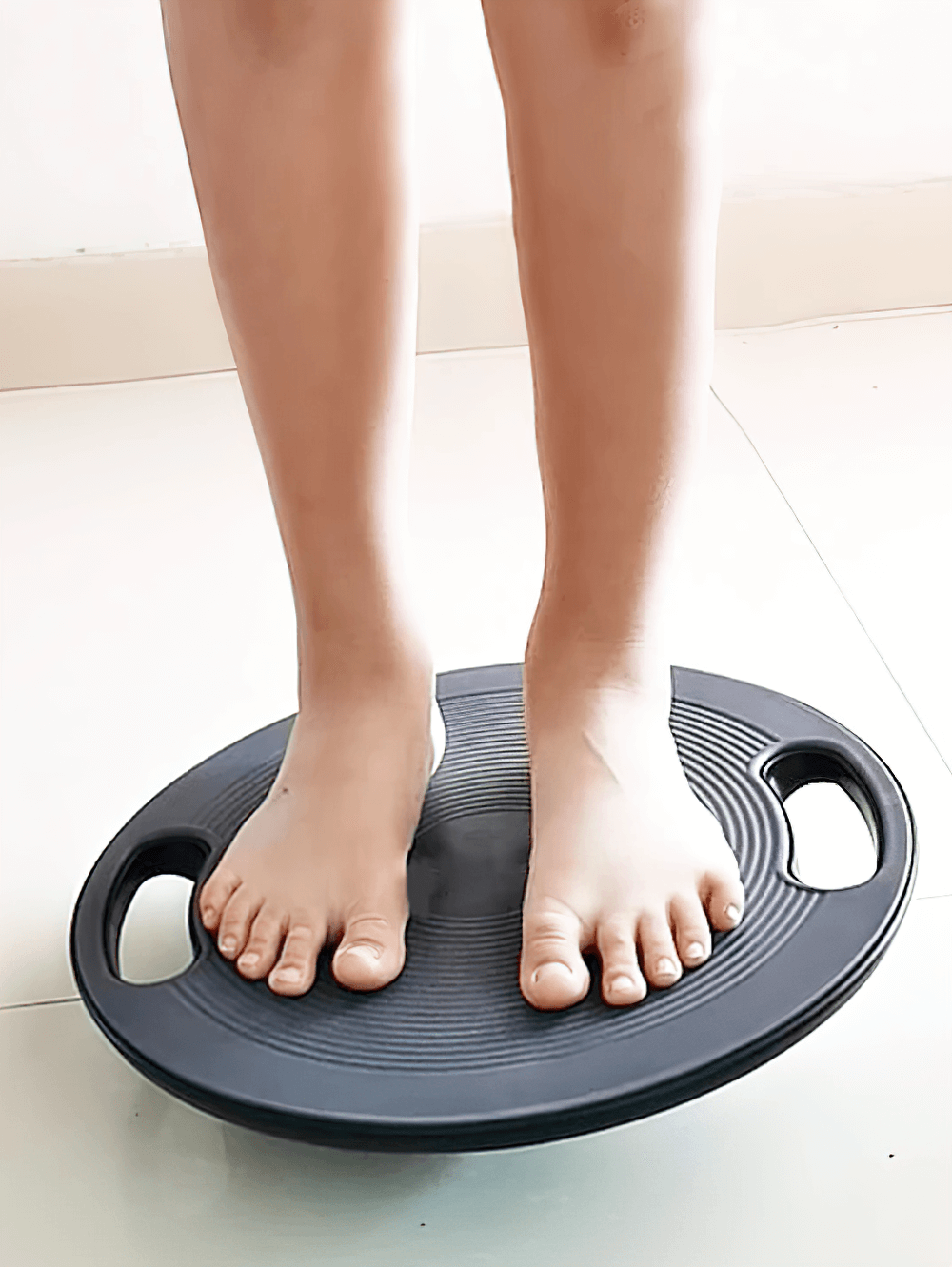 Person using Anti-Slip Fitness Balance Board with Handles - SF3501 for exercise.