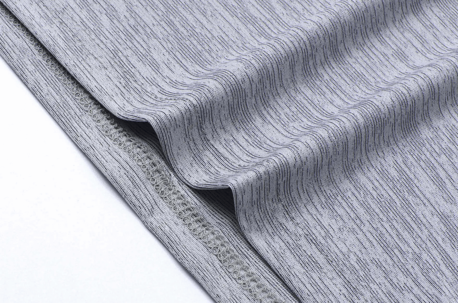 Close-up view of breathable quick-dry fabric texture of Athletic Fit Zip High Collar T-Shirt, showcasing sleek, sporty material design.