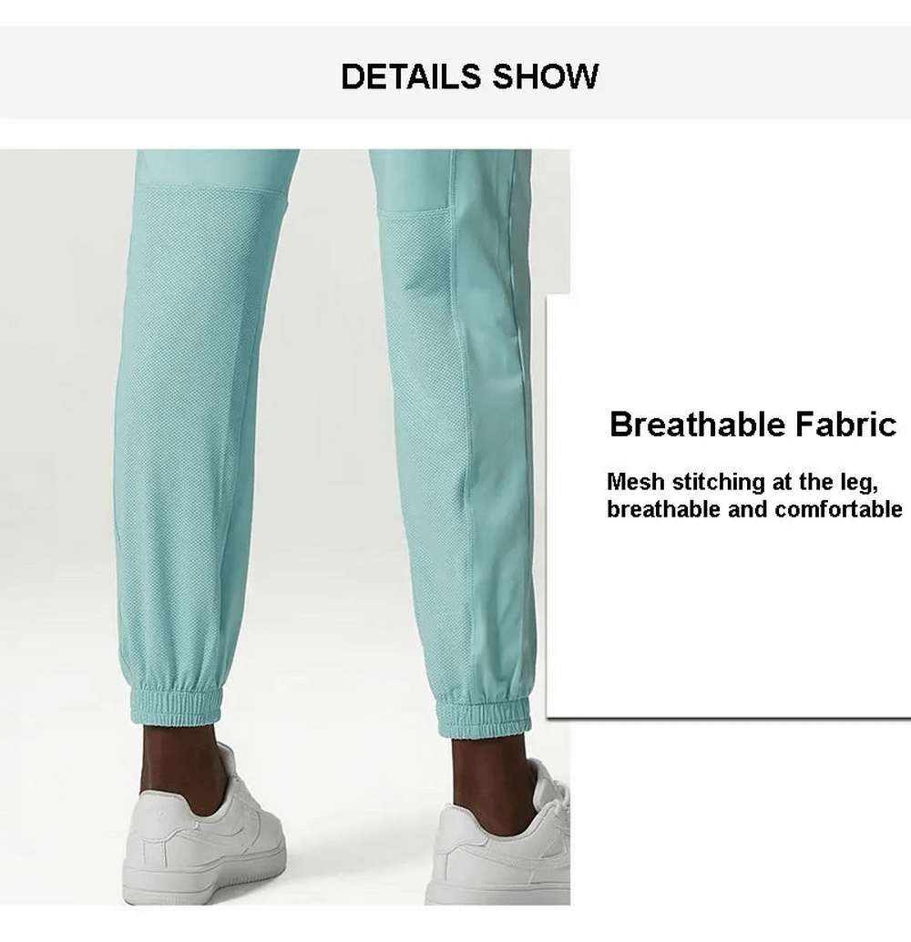 Close-up of aqua athletic pants featuring breathable mesh stitching and comfortable design for women's activewear.